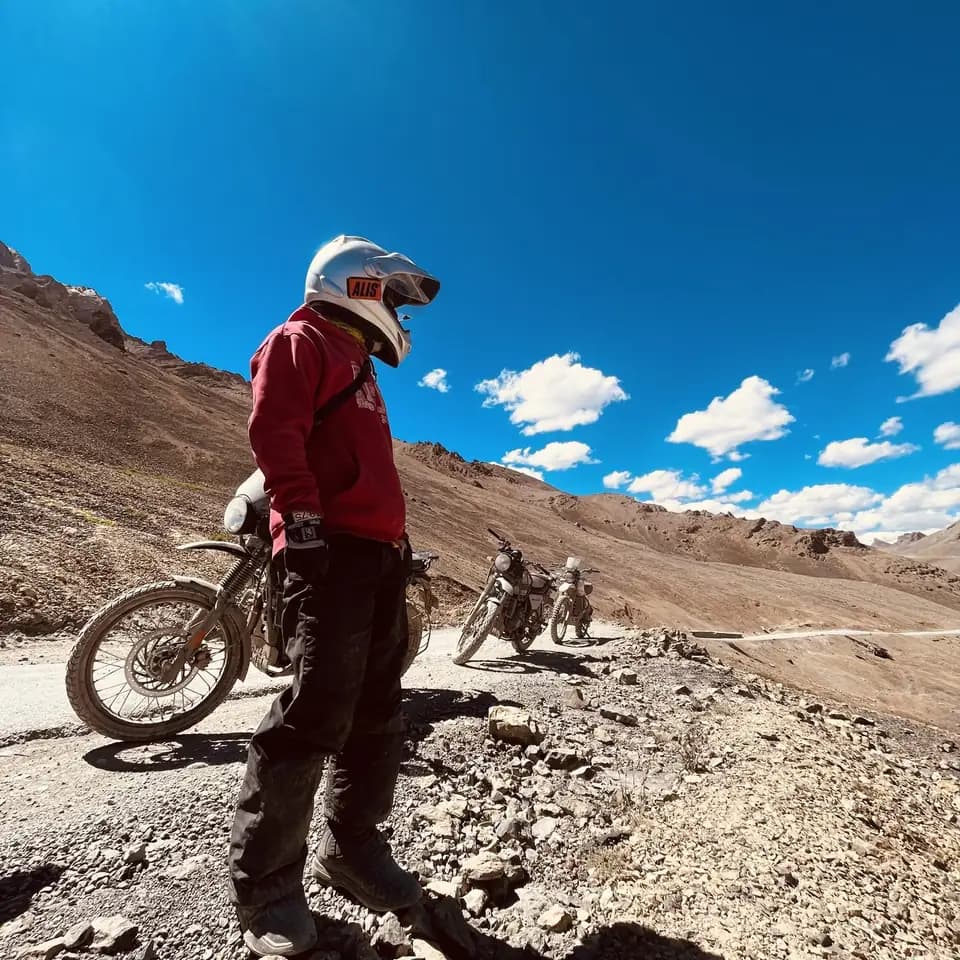 Motorcycle traveller on a Himalayan mountain road